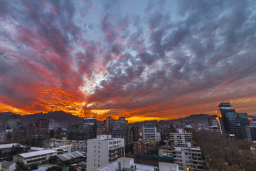 Obraz premium Sunset over Santiago de Chile city, an amazing and colorful skyline