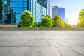 empty square floor and modern commercial office buildings in shanghai