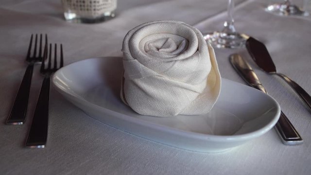 Close up, folded napkin on fancy table