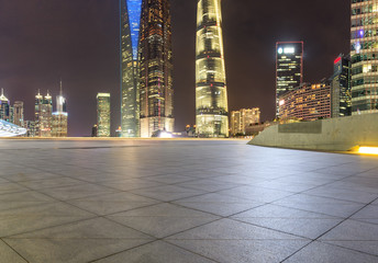 empty square floor and city skyline scene in shanghai at night