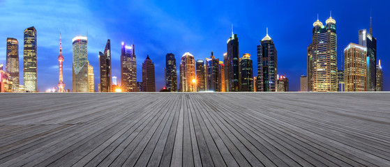 empty boardwalk square floor and city skyline scene in shanghai