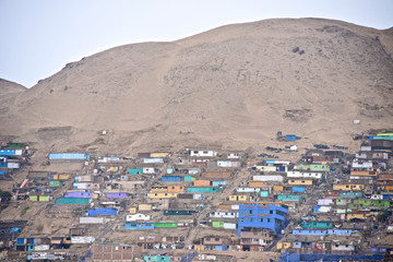 Hillside slum buildings on the outskirts of Lima, Peru