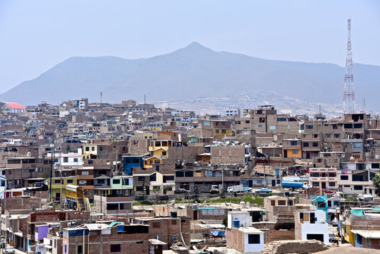 Urban housing development in the desert near the Pachacamac archaeological site. Lima, Peru