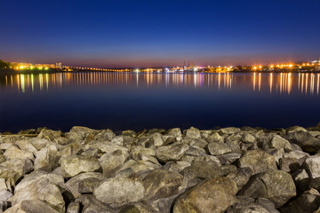 Night time Liverpool city reflections in to the Merseyside River