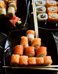 Japanese sushi on black plate