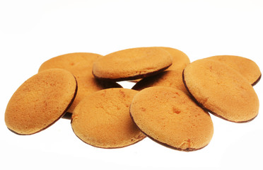chocolate cookies over white background, close up