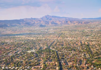 Schilderijen op glas Aerial view of Las Vegas City  Early in the morning scene seen from an airplane window © raksyBH