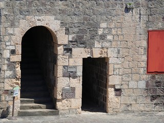 Doors in a fort Arch and rectangular doors in an old brick building