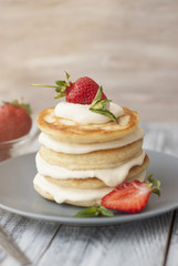 Sweet Pancakes with Cream and Strawbery. Health Breakfast Fruit Berry Vitamine Gray Rustic Wooden Background