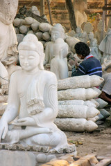 Local man working on a statue near Mahamuni Pagoda in Mandalay, Myanmar