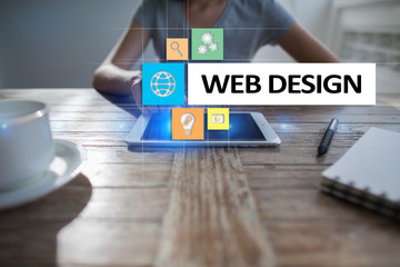 Web design and development concept on the virtual screen.