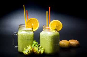 Kiwi fruit smoothies in jars