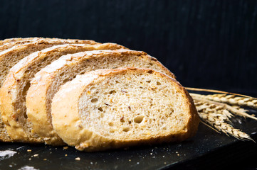 Wheat bread slices on a cutting board
