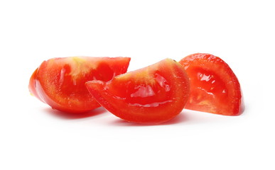 Fresh red tomato slices isolated on white background