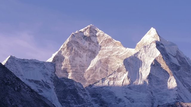 Time lapse zoom of Kangtega peak (6782 m) at sunrise. Nepal, Himalaya mountains.