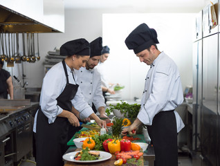 team cooks and chefs preparing meals