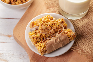 Granola bar on wooden background