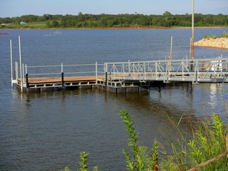 Fototapeta na wymiar Boat harbor and dock at a lake