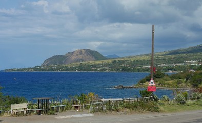 Scenic coastal view of the Challengers Village in St. Kitts, West Indies 