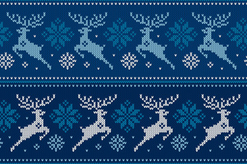 Fototapeta premium Winter Holiday Seamless Knitting Pattern with Christmas Reindeer and Snowflakes. Wool Knitted Sweater Design