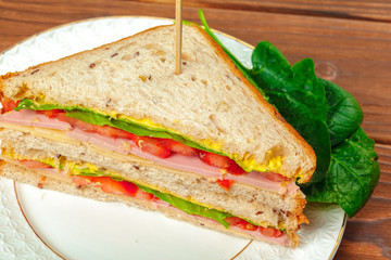 sandwich on a wooden table