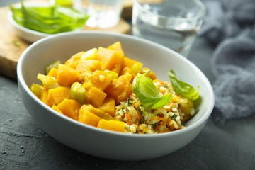 Pumpkin stew with rice and fresh basil