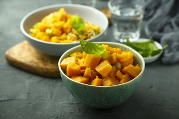 Pumpkin stew with rice and fresh basil