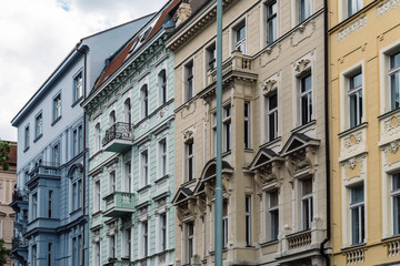 Fototapeta na wymiar Old residential buildings in Prague