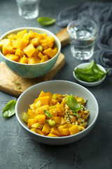 Pumpkin stew with rice and fresh basil
