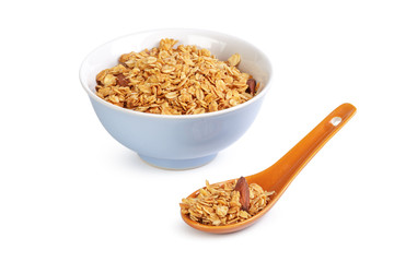 Bowl of whole grain muesli isolated on white background