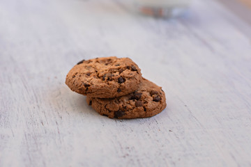 Chocolate chips cookies/ American cookies at light wooden background/ 