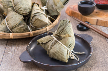 Fototapeta na wymiar Zongzi or rice dumpling on Dragon Boat Festival, Asian traditional food