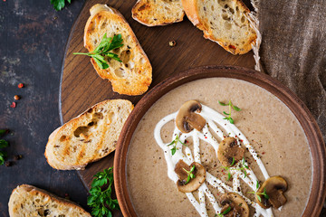 Mushroom cream soup. Vegan food. Dietary menu. Top view. Flat lat.