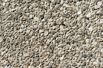 Ground stone background of many small stones.
