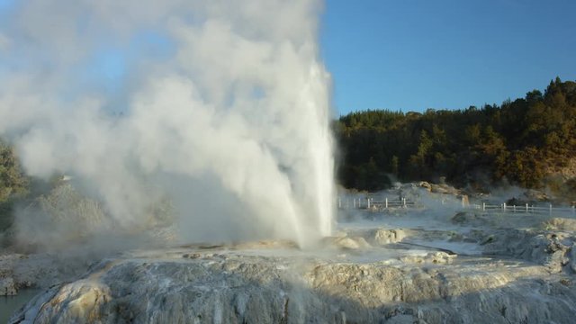 Drone shot tracking around powerful geyser in Rotorua