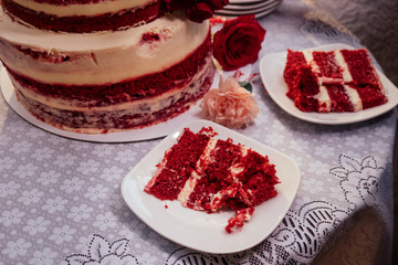appetizing red wedding cake decorated with red rose