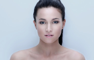 close-up of a young woman with daily make-up. concept of skin care