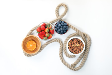 Blueberry Strawberry Herb Spice Almond Cashew Nut Mandarin Orange in bowl on white background