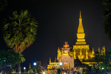 Pha That Luang a gold buddhist stupa in the night, landmark of Vientiane, Laos PDR.