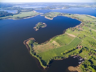 Aerial view of beautiful landscape of Mazury region, Swiecajty Lake, Poland