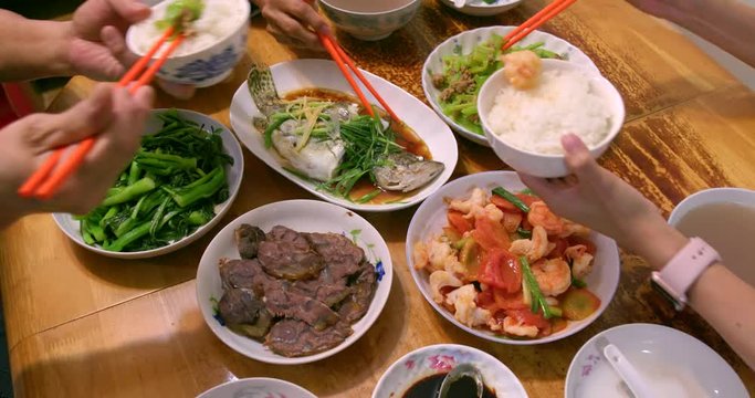 Family gatherer with lots of dishes on the table