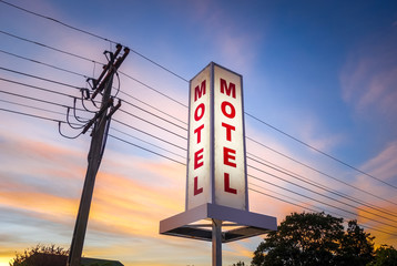 Vintage motel sign at sunset