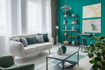 Green cosy living room interior