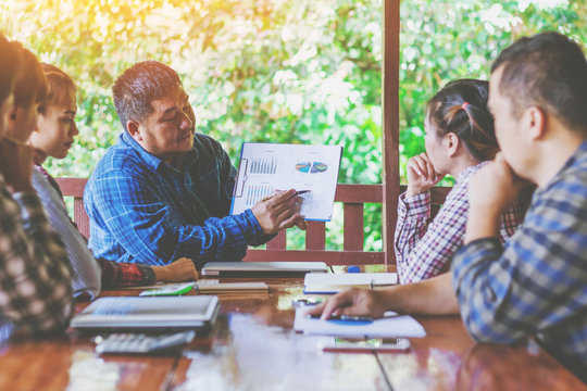 businessman explaining a business plan at meeting at home.