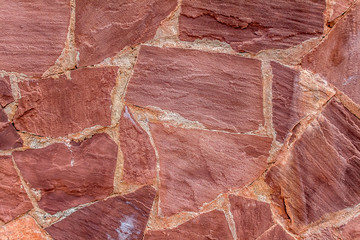 Fototapeta premium Wall of a flat natural stone