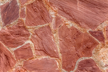 Wall of a flat natural stone