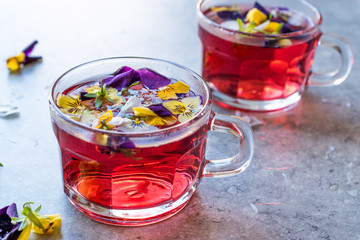Red Herbal Tea with Edible Flowers.