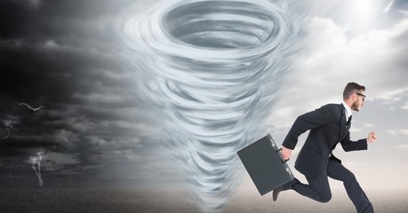 Fototapeta premium Tornado twister painted and dark sky with businessman running
