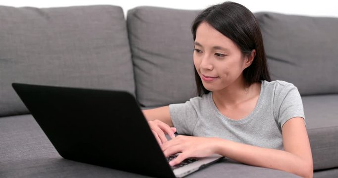 Woman use of laptop computer at home