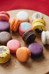 Composition of delicious colorful macaroons, sweet dessert